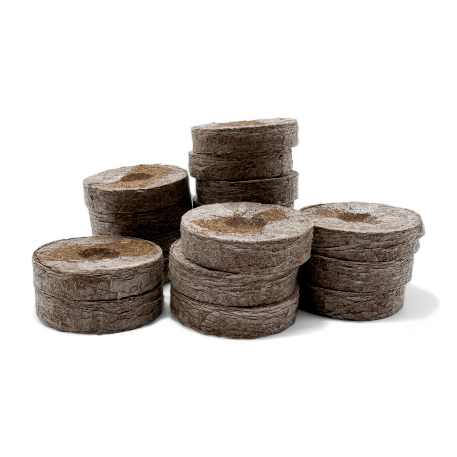 Displayed Jiffy Pellets (42mm) compressed seed starting plugs on a white surface