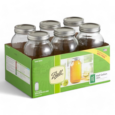 A six pack of Ball mason jars with lids arranged for display