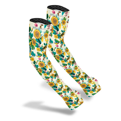 Floral patterned gardening arm protectors with yellow flowers and green leaves