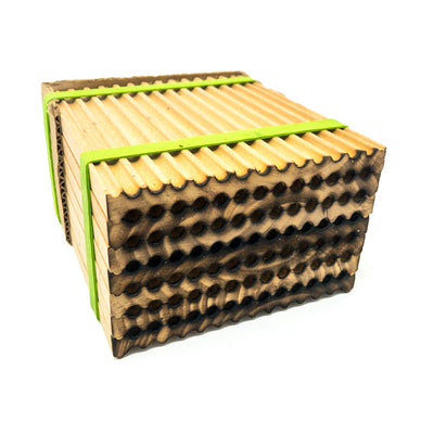 Small wooden trays for leafcutter bees bundled with a green strap