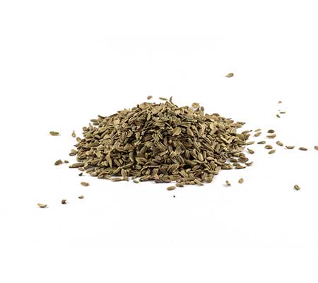 Close-up of Scarlet Nantes carrot seeds in a pile with a white backdrop