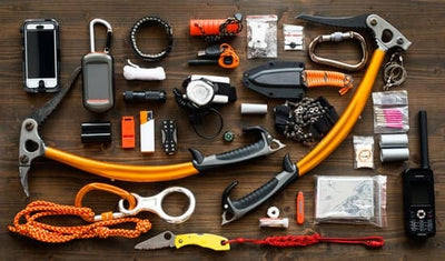 A prepper's basic survival kit with many items