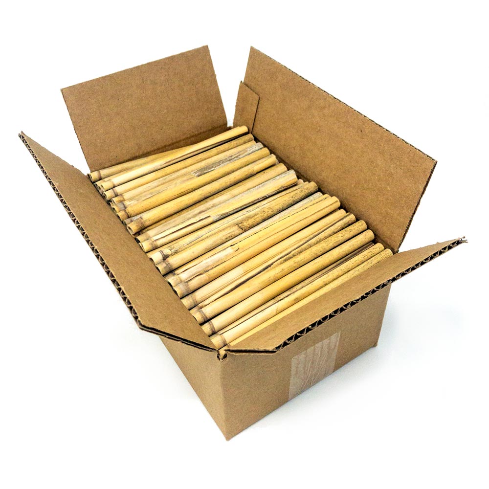 An assortment of 8mm wooden reeds for Mason Bees organized in a box container