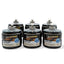 Set of emergency candles with black lids and white labels indicating 100-hour burn time