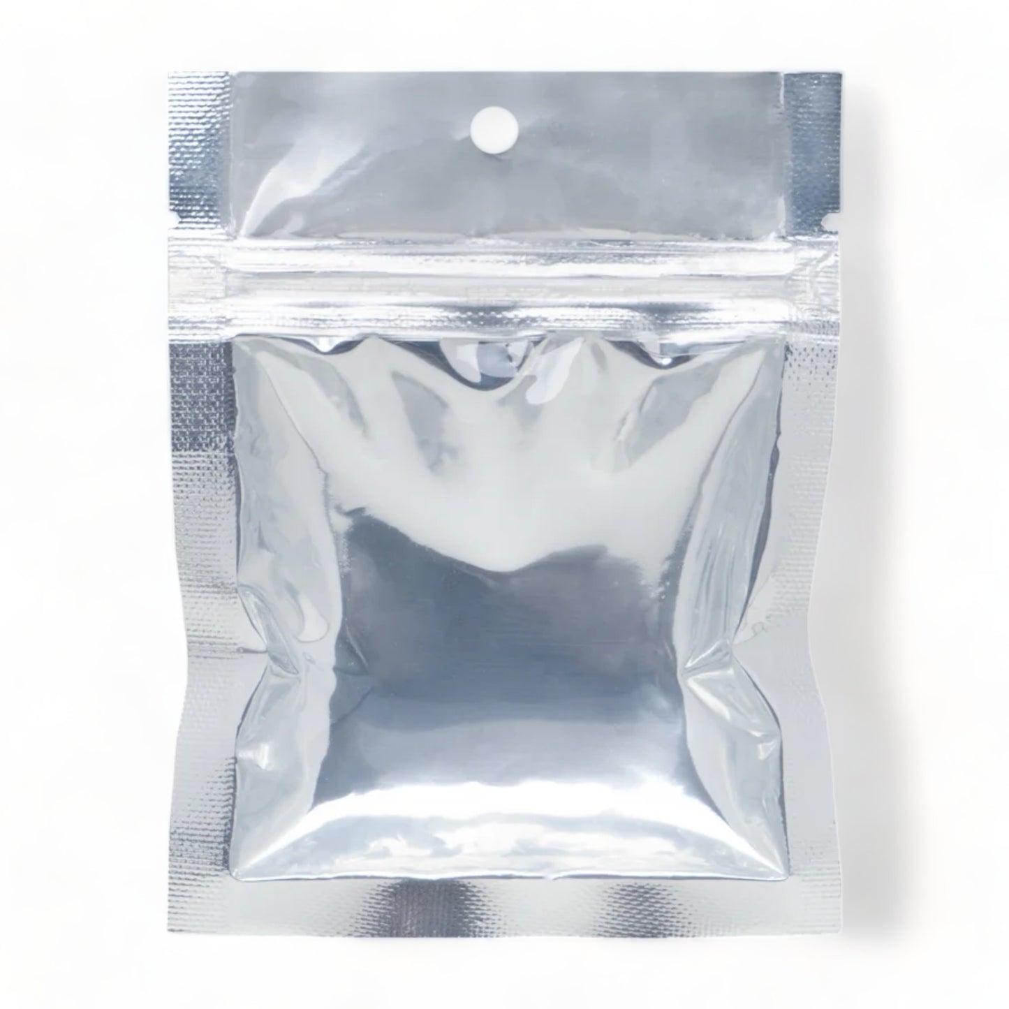 A single metallic seed saving packet on a white background