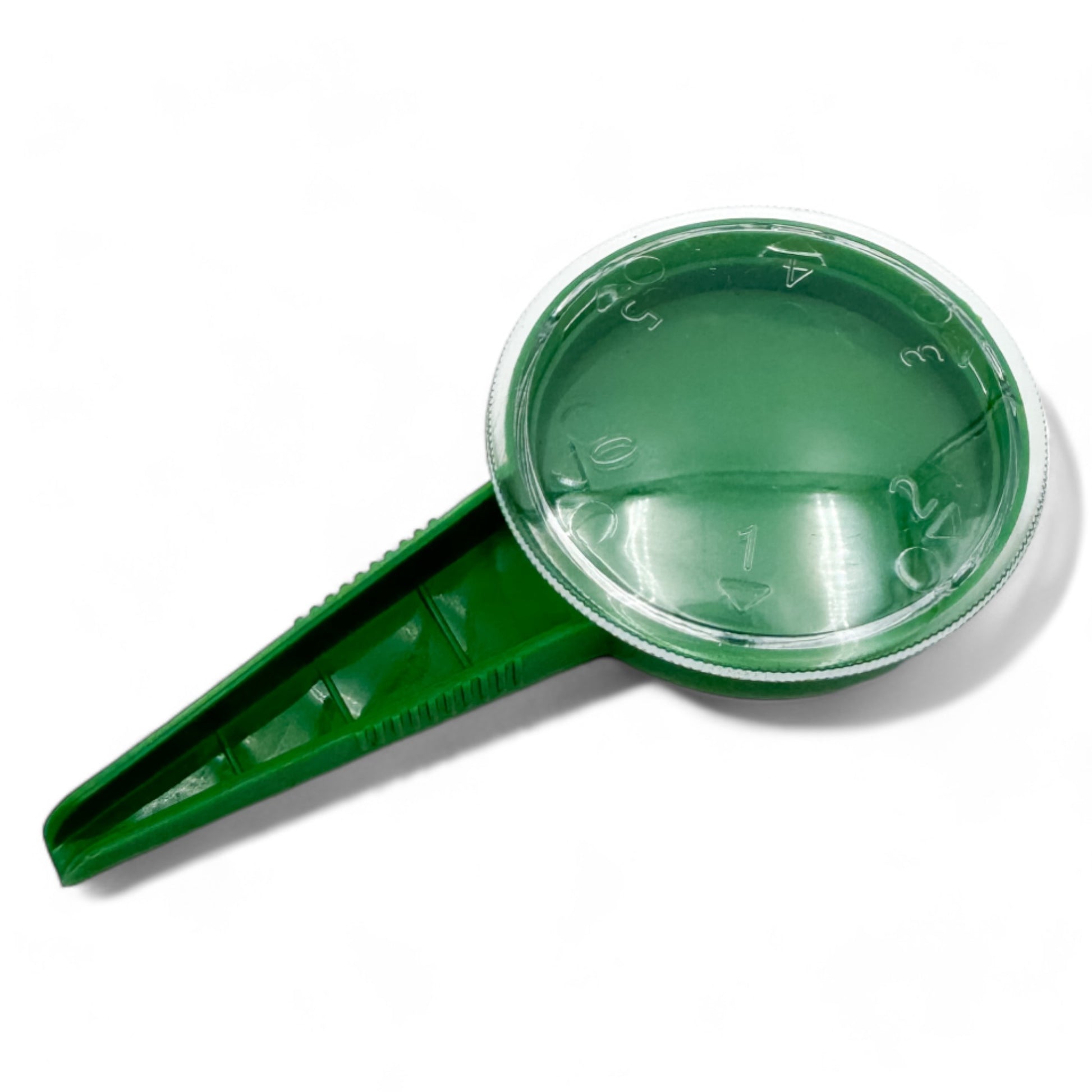 Handheld seed dispenser in green with closed lid