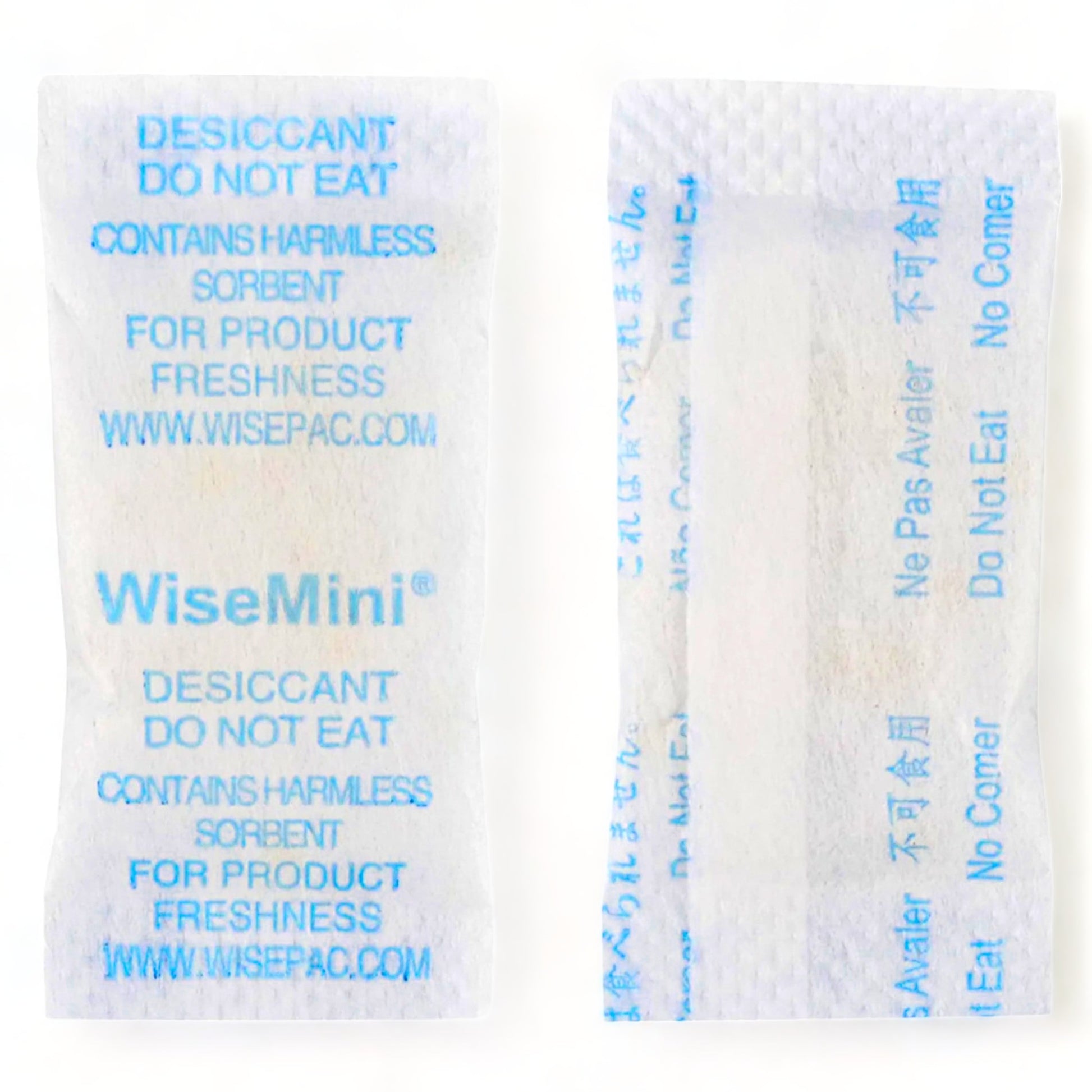 Multiple silica gel desiccant packs displayed against a white backdrop