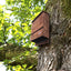 Outer Trails™ Multi Chamber Bat House installed on a tree in a natural habitat