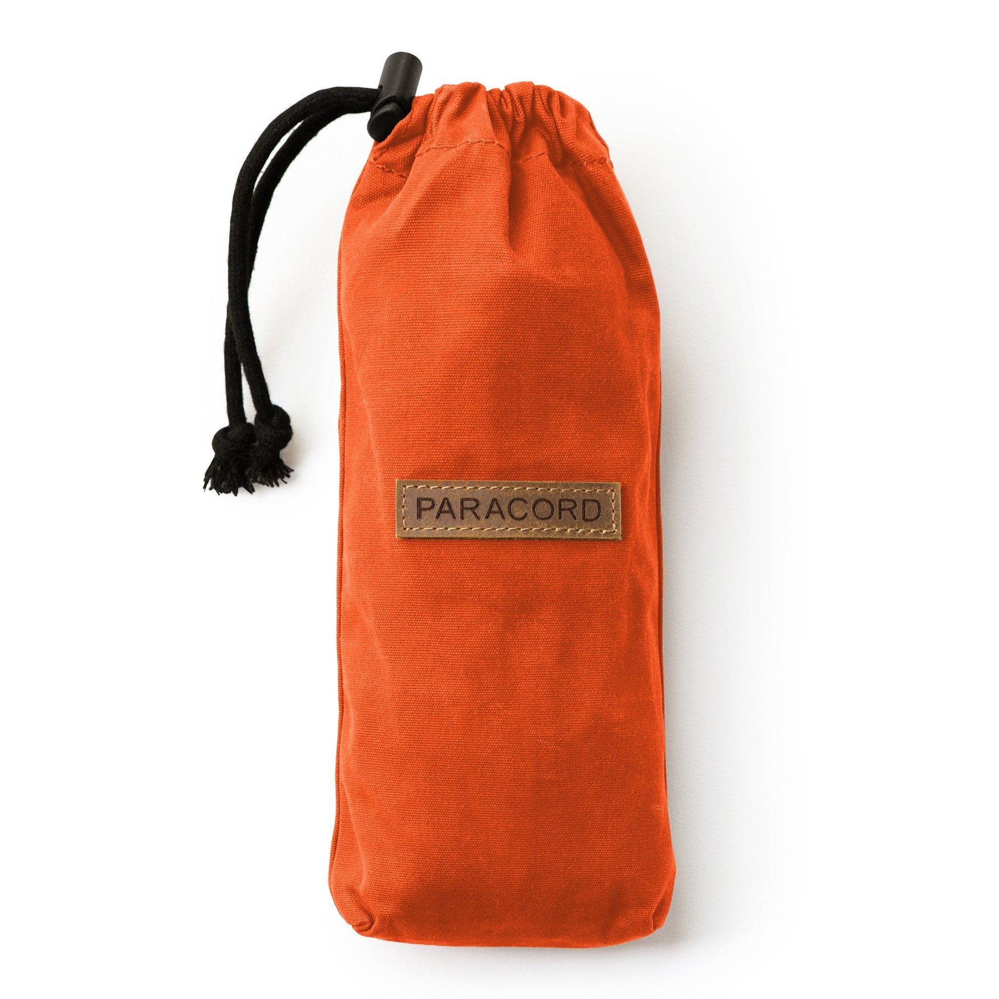 Orange Canvas Bushcraft Bag with a clearly visible brand label