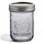 A small Ball mason jar with a wide mouth metal lid and measuring levels showing