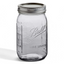 A large Ball mason jar with a metal lid and measuring levels showing