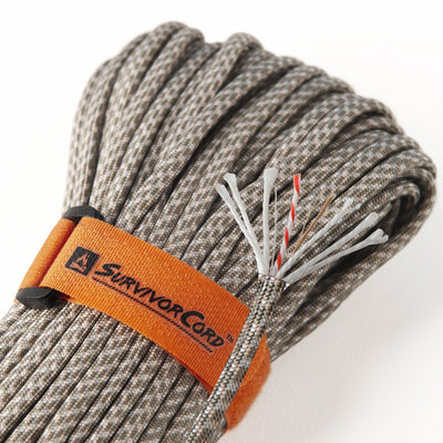 Detail of ACU gray SurvivorCord with cord construction exposed and visible identification tags