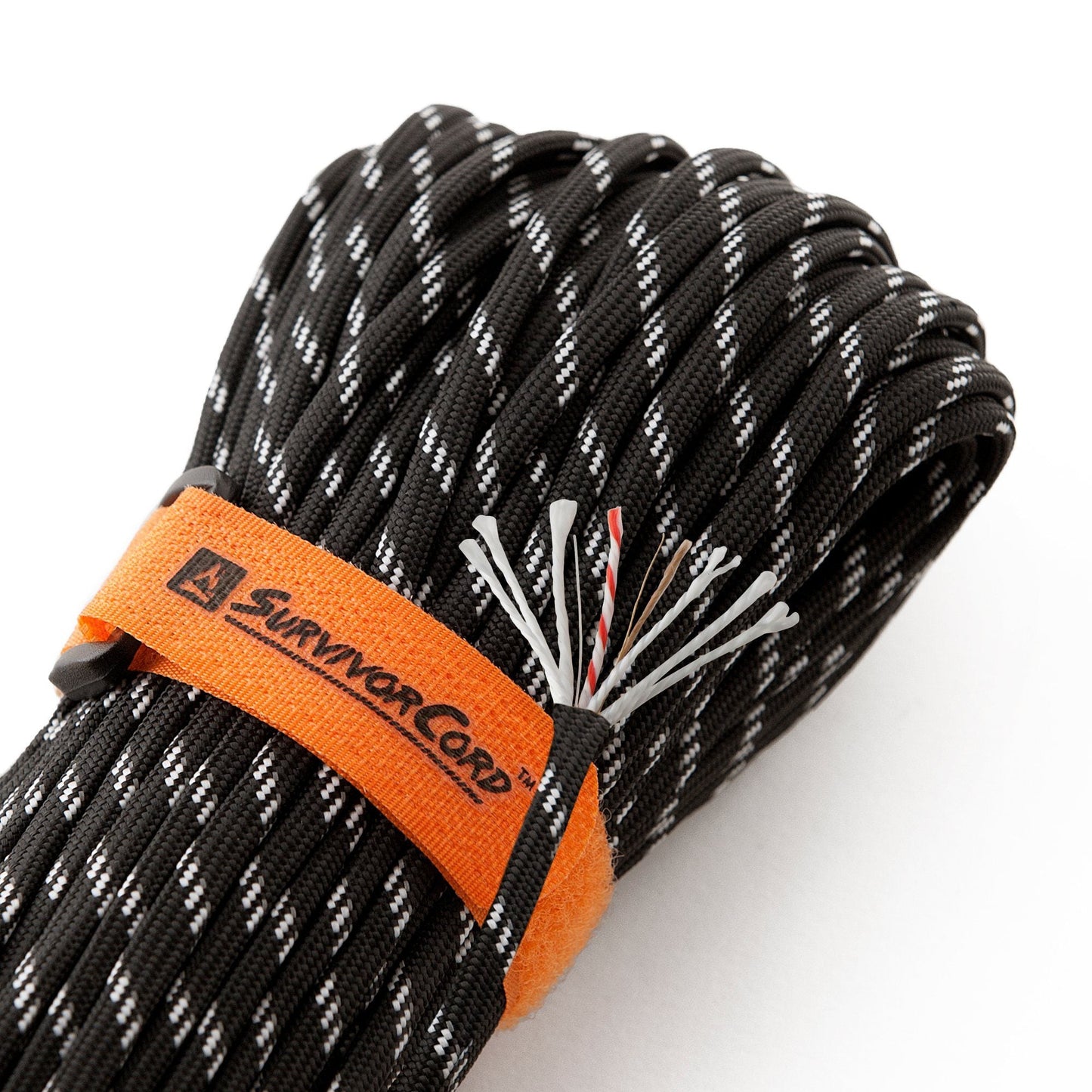 Detail of ACU reflective-black SurvivorCord with cord construction exposed and visible identification tags
