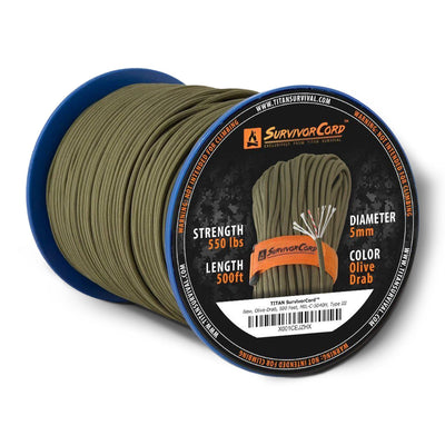 A spool of olive-drab SurvivorCord with visible text indicating durability and length