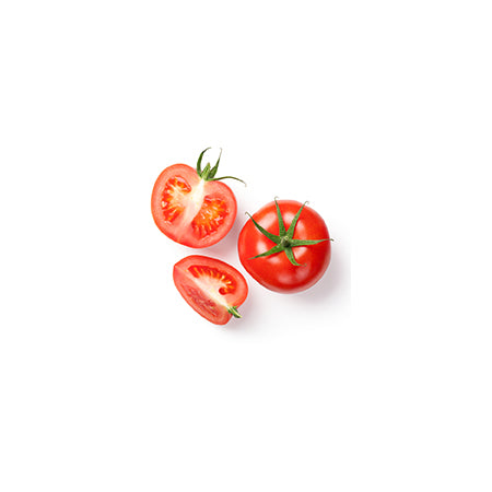Dispaly of fully grown, cut up Floradade Heirloom Tomatos on a white background